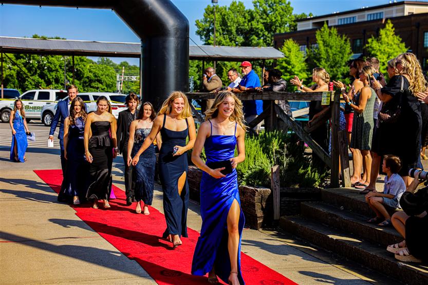 Students walk down the red carpet at the WILLCO Awards